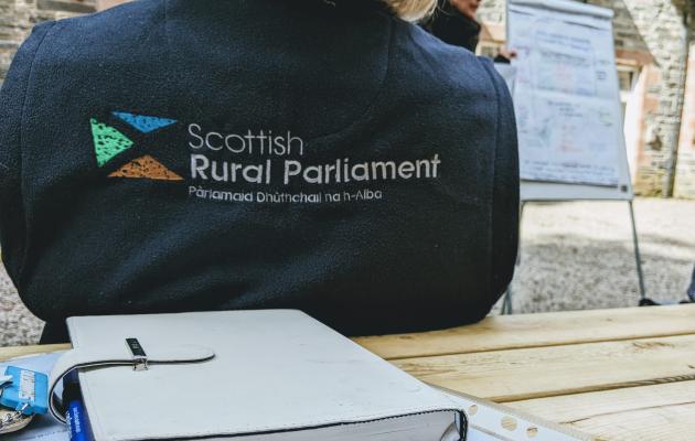 Image of jumper that says 'Scottish Rural Parliament 2023'.
