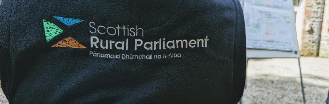 Image of jumper that says 'Scottish Rural Parliament 2023'.